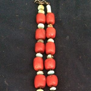 Coral artisan necklace with silver cross